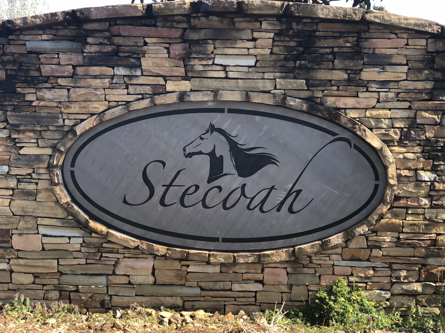 Stecoah entrance sign set in stone